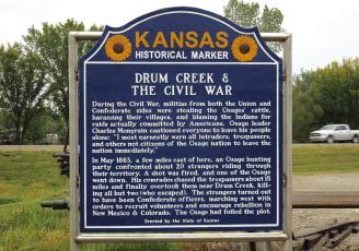 BEGINNING THE TOUR — First stop on the Kansas Historical Marker Tour: The bright blue metal sign that commemorates the events that happened at nearby Drum Creek during the Civil War. This marker stands on the east side of Independence as you head down Highway 160. Historical Marker Database | Courtesy Photo